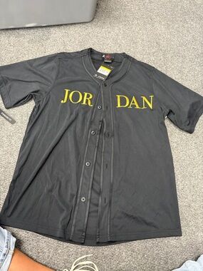 Jordan Men’s Black Jersey with Yellow Lettering